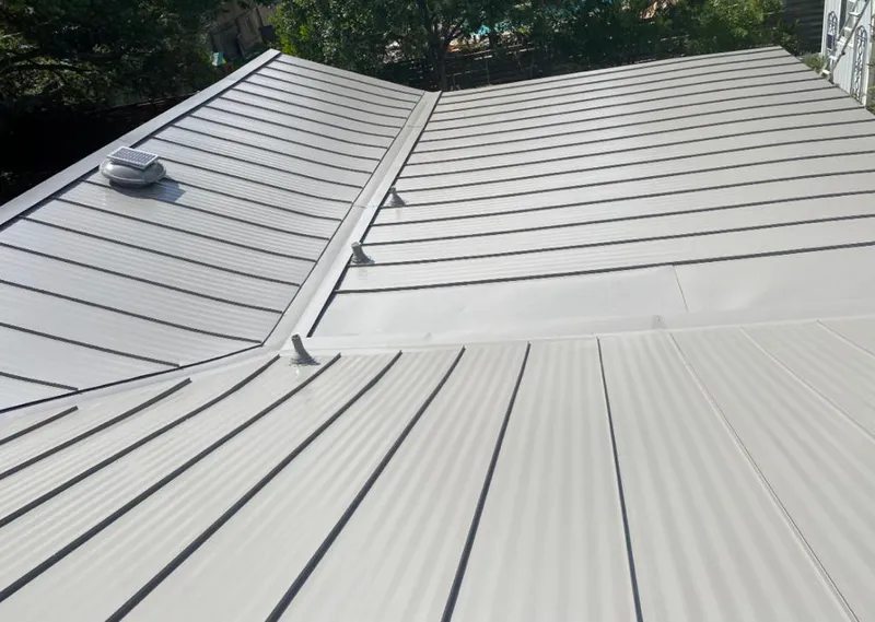 Solar attic fan installed on a metal roof for Roof Ventilation in East Bay